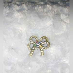 An Eastern Star Bow Shaped Brooch
